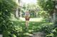 A woman walking through a lush green park with a backpack.